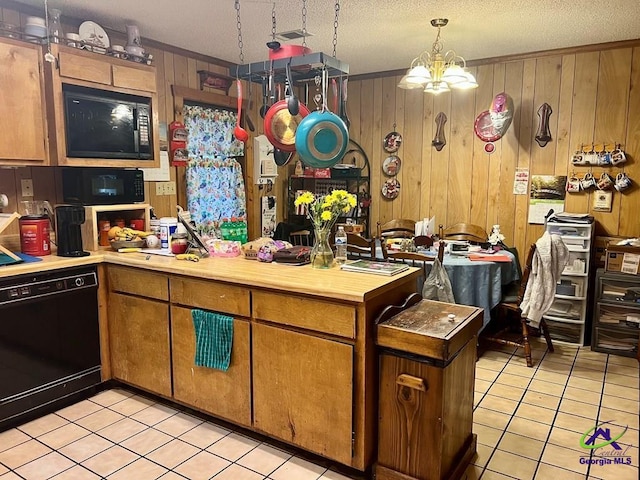 kitchen with black appliances, light tile patterned floors, brown cabinets, and light countertops