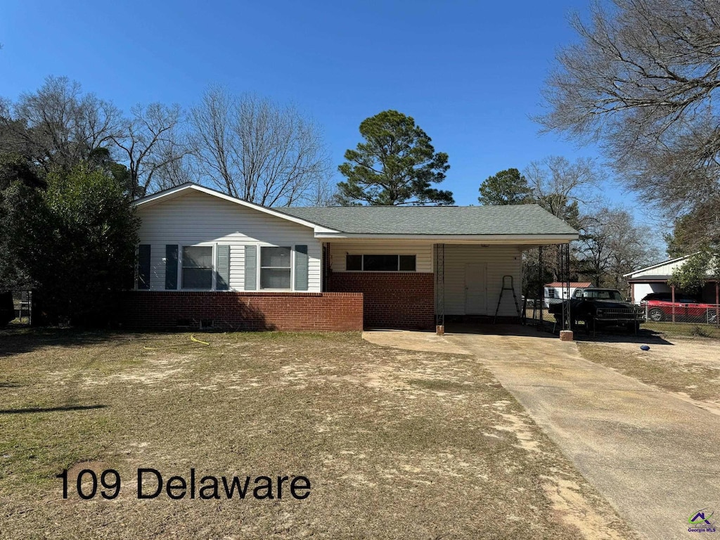 view of front of home featuring brick siding