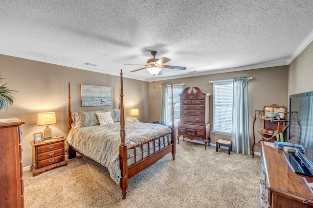 bedroom featuring light carpet, visible vents, baseboards, a ceiling fan, and crown molding