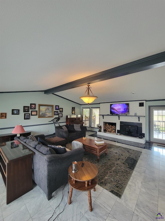 living area with lofted ceiling with beams, marble finish floor, a fireplace with raised hearth, and a textured ceiling