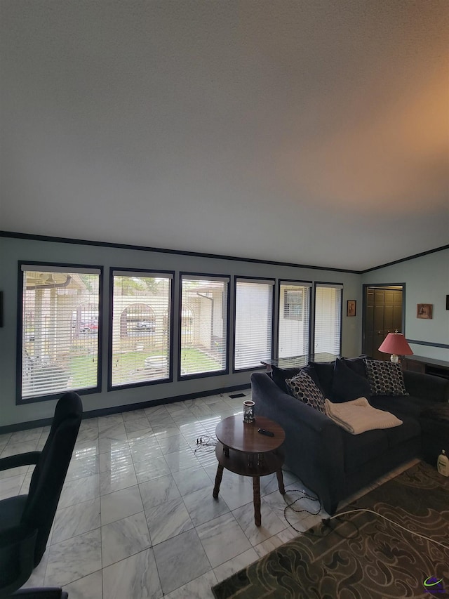 living room with marble finish floor and vaulted ceiling
