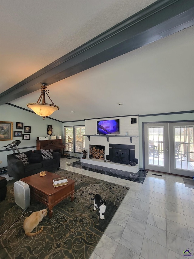 living room with a fireplace with raised hearth, marble finish floor, beamed ceiling, and crown molding