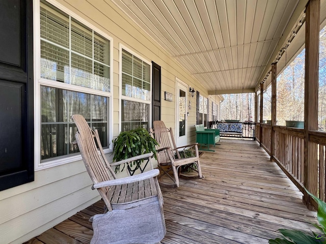 wooden terrace with covered porch