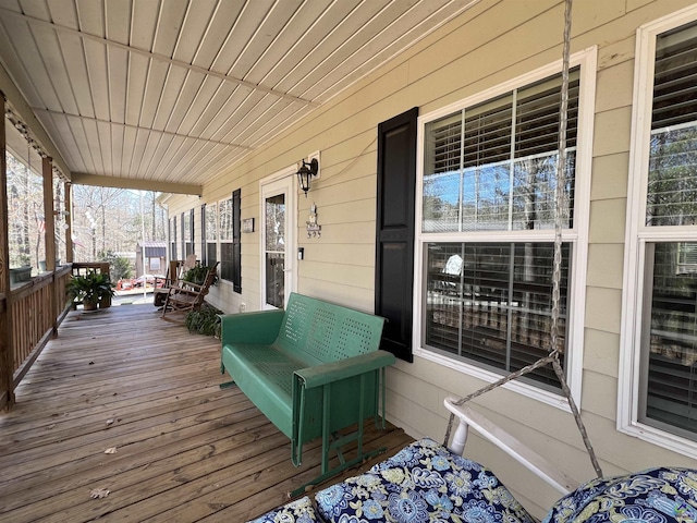 wooden deck featuring a porch