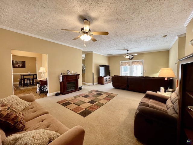 living room featuring carpet, ornamental molding, a textured ceiling, and a fireplace