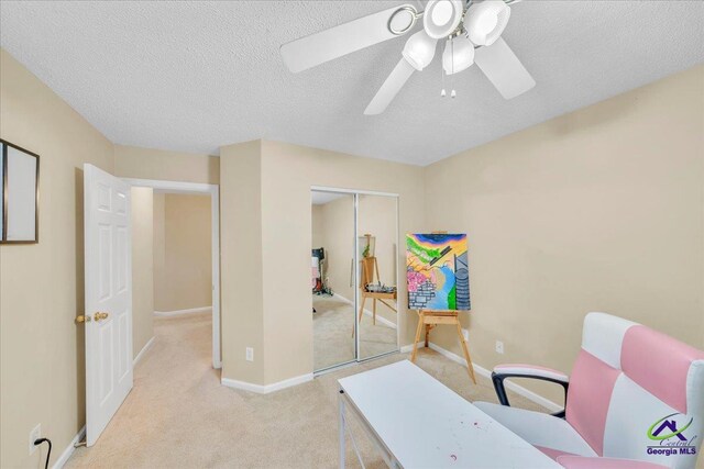 210 Cumberland Woods Ter, Warner Robins, GA 31088 - office space with a textured ceiling, light carpet, a ceiling fan, and baseboards