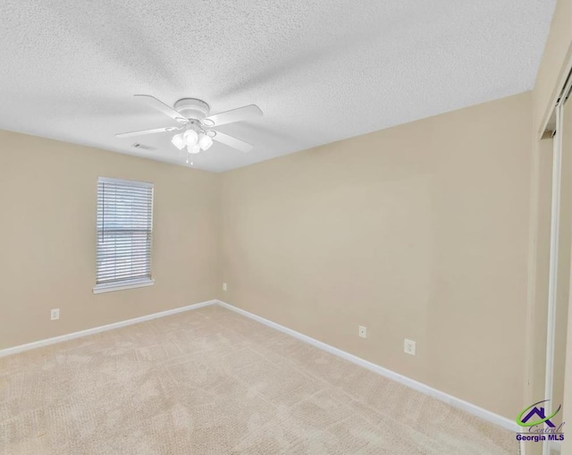 210 Cumberland Woods Ter, Warner Robins, GA 31088 - unfurnished room featuring visible vents, light carpet, ceiling fan, a textured ceiling, and baseboards