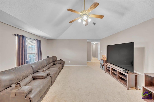 210 Cumberland Woods Ter, Warner Robins, GA 31088 - living area featuring light carpet, baseboards, visible vents, ceiling fan, and vaulted ceiling