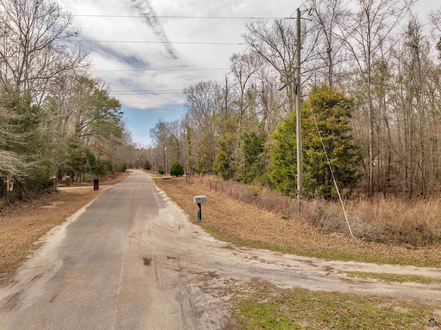 view of road with a view of trees