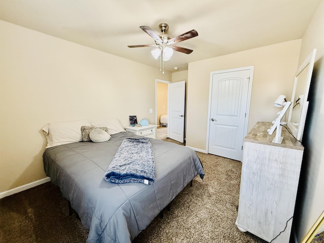 bedroom with baseboards, a ceiling fan, and light colored carpet