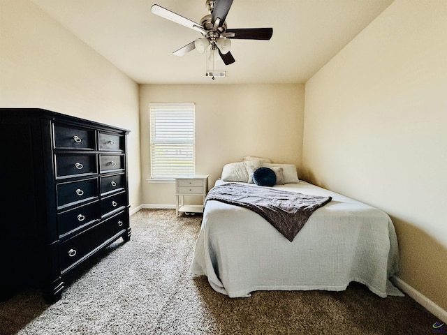 bedroom with light carpet, baseboards, visible vents, and a ceiling fan