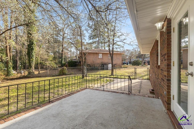 view of patio with fence