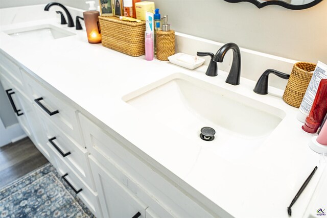 room details featuring a sink and double vanity