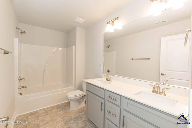 full bath featuring toilet, visible vents, shower / washtub combination, and a sink