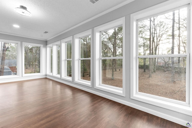 unfurnished sunroom with a healthy amount of sunlight