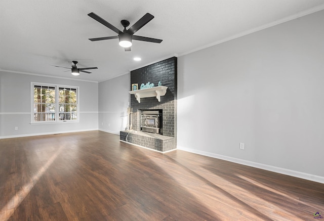unfurnished living room with ceiling fan, crown molding, baseboards, and wood finished floors