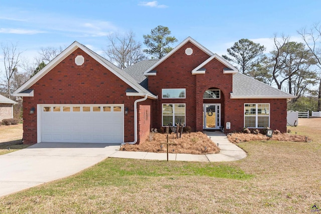 traditional-style house featuring brick siding, driveway, a front lawn, and roof with shingles