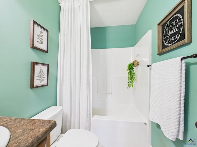 full bath with vanity, toilet, and shower / tub combo