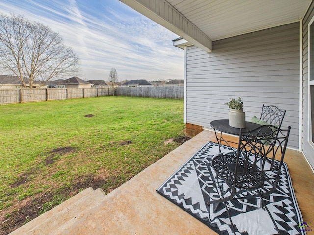 view of yard featuring a patio and a fenced backyard