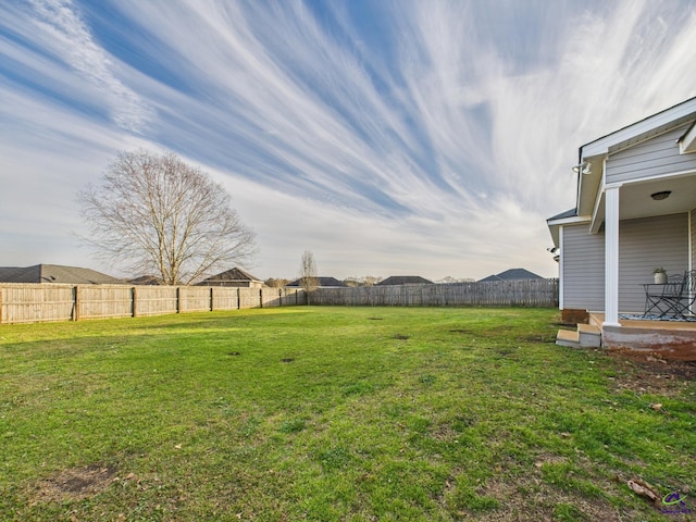 view of yard featuring a fenced backyard