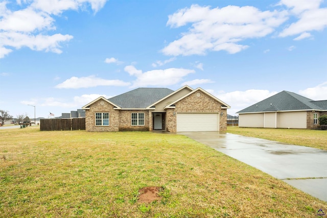 ranch-style house featuring driveway, brick siding, an attached garage, and fence