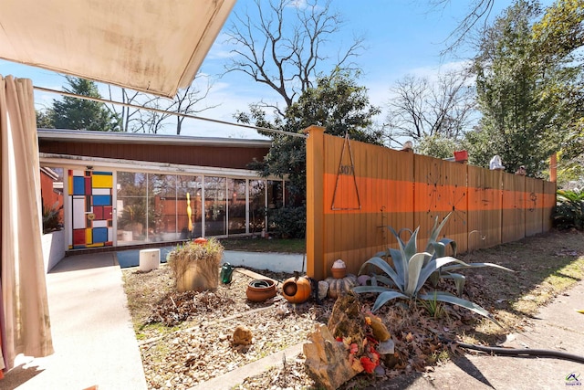 view of yard with fence