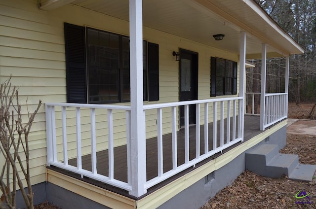 exterior space featuring crawl space and a porch