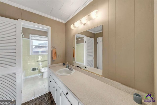 bathroom featuring vanity, visible vents, ornamental molding, tile patterned floors, and toilet