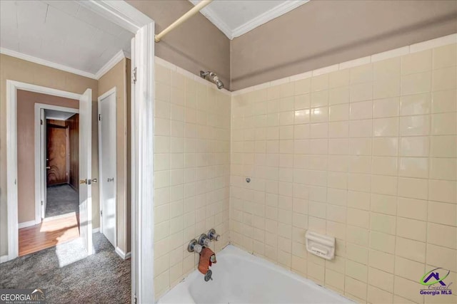 full bath with bathing tub / shower combination and crown molding