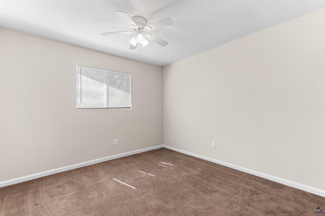 empty room with baseboards, carpet floors, a textured ceiling, and ceiling fan