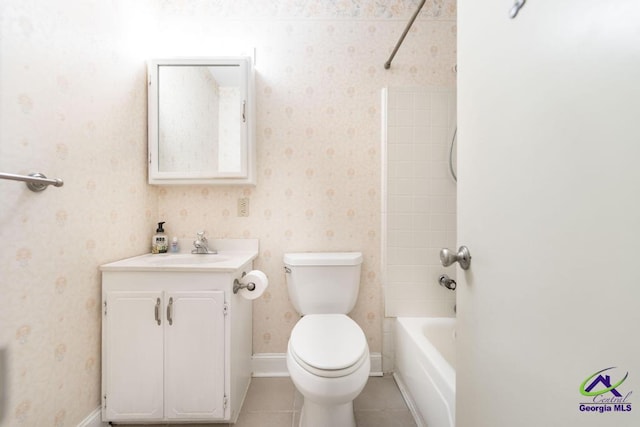 full bath featuring vanity, baseboards, wallpapered walls, tile patterned flooring, and toilet