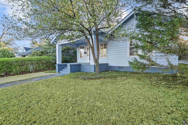 view of home's exterior featuring a yard and crawl space