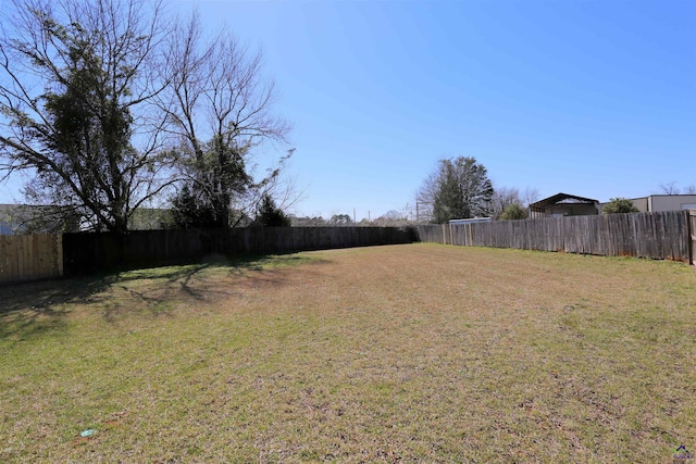 view of yard featuring fence