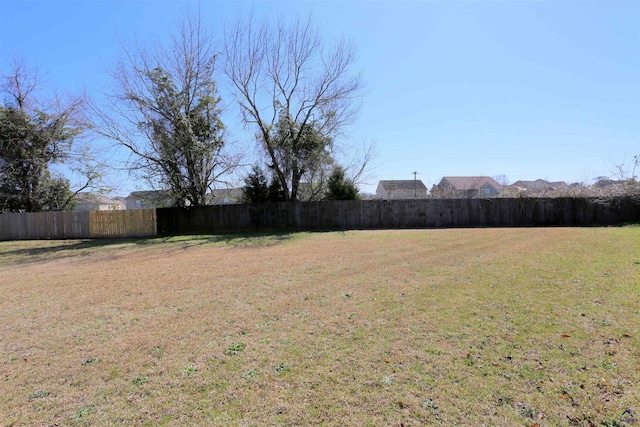 view of yard with fence