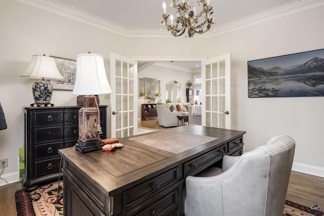 home office with arched walkways, french doors, crown molding, and wood finished floors