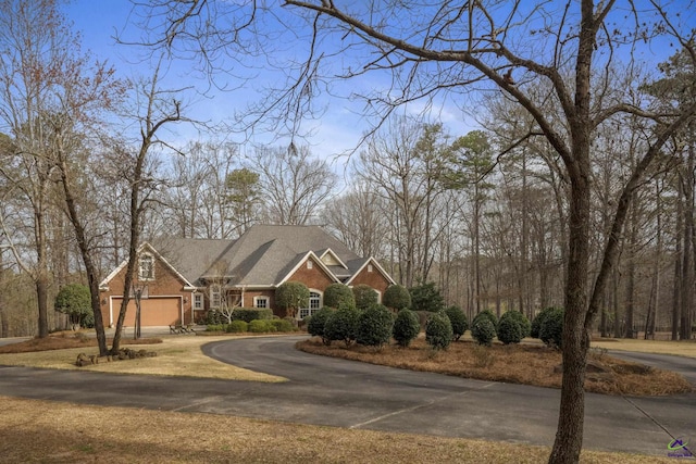 view of front of house featuring driveway and a garage