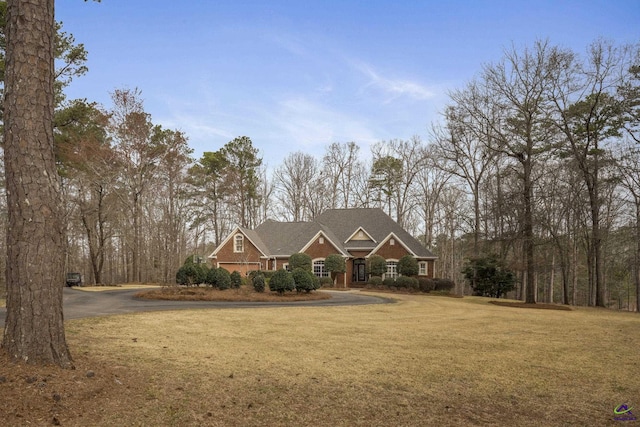 craftsman house with a front lawn