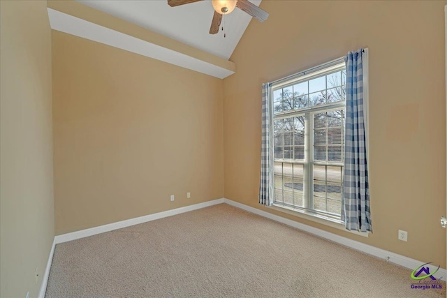 unfurnished room featuring baseboards, high vaulted ceiling, ceiling fan, and carpet flooring