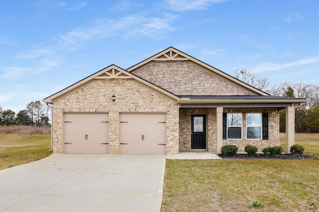 craftsman-style house with brick siding, an attached garage, concrete driveway, and a front lawn