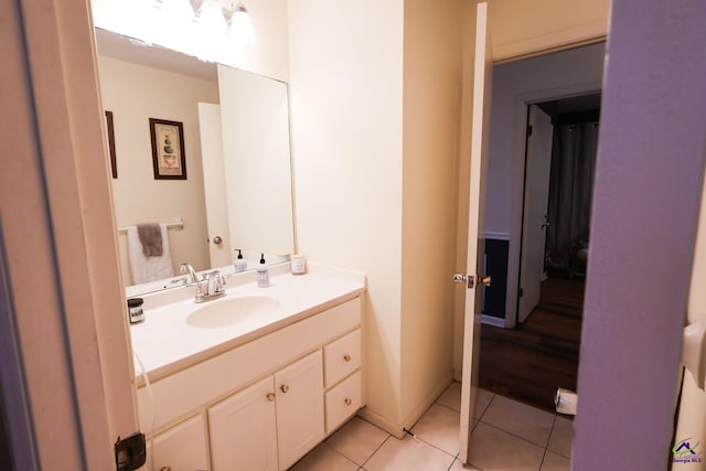 bathroom with vanity and tile patterned floors