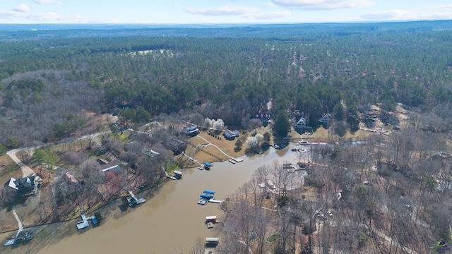 bird's eye view featuring a wooded view