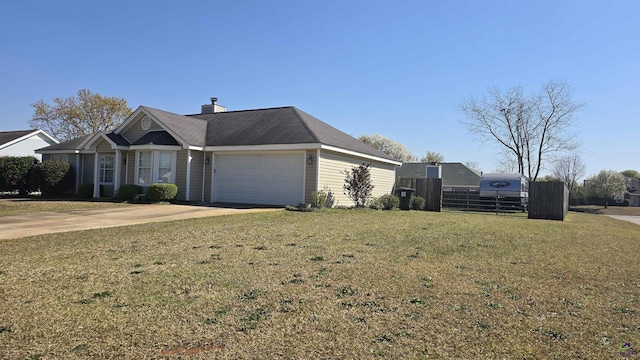 view of front of house with fence, a front yard, a chimney, driveway, and an attached garage