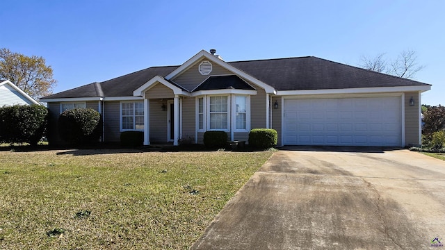 single story home with a garage, driveway, and a front yard