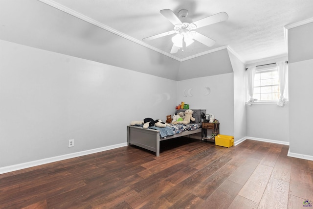 bedroom with crown molding, a ceiling fan, baseboards, and wood-type flooring