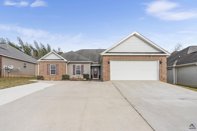 ranch-style home with brick siding, an attached garage, and driveway