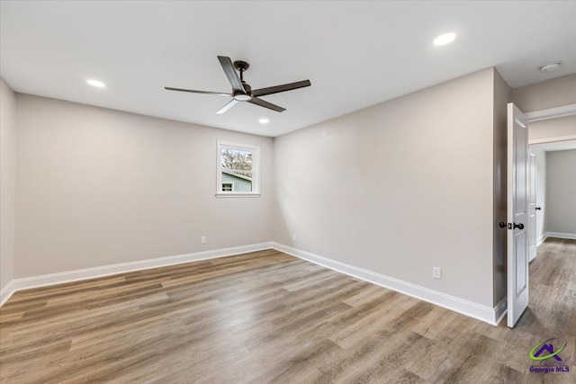 unfurnished room with recessed lighting, baseboards, wood finished floors, and ceiling fan