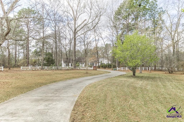 view of road featuring driveway