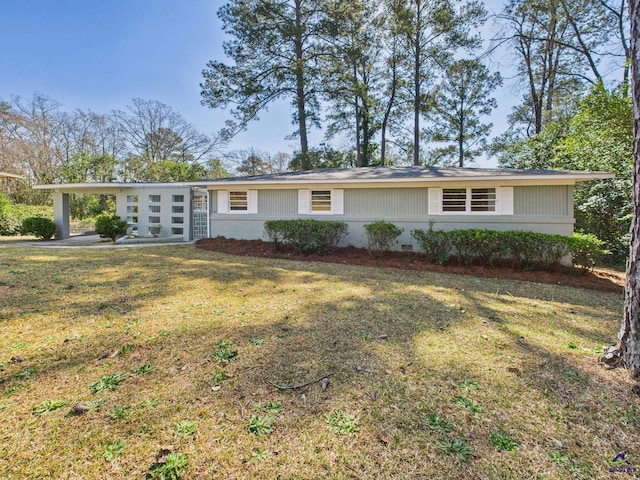 single story home with crawl space and a front lawn