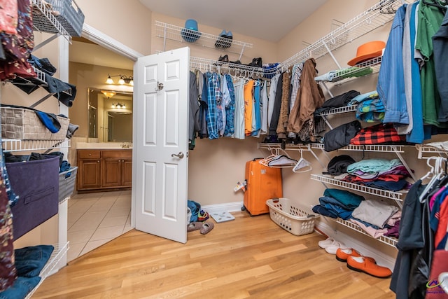 spacious closet featuring wood finished floors