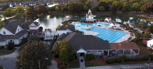 bird's eye view with a water view